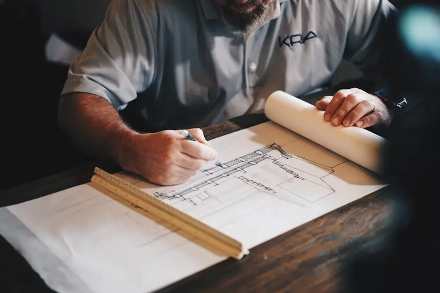 An architect drawing house plans for a new build