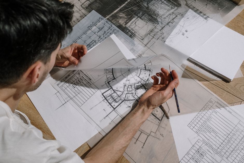 Architectural plans and specifications laid out for a residential build
