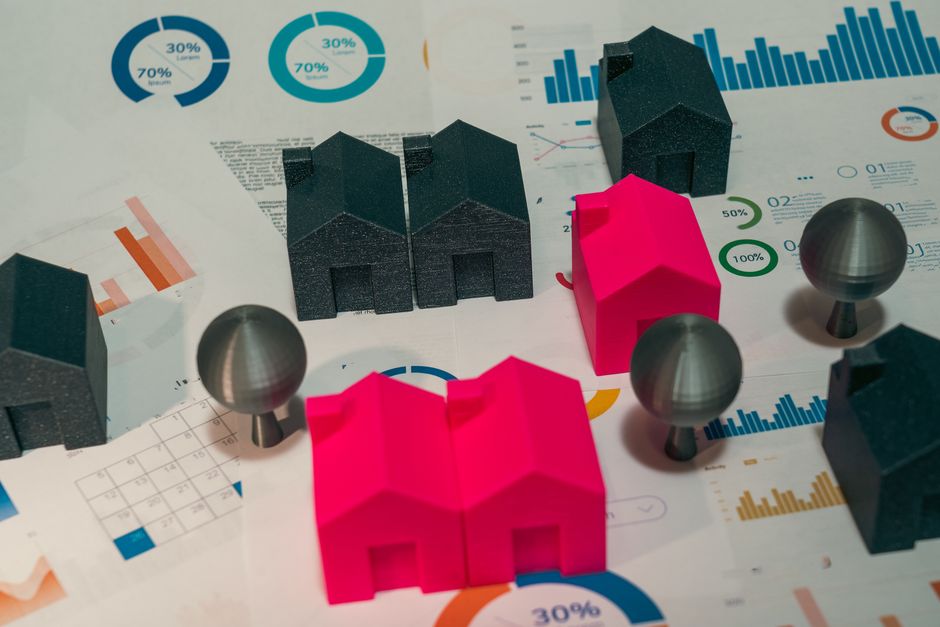 Property investor reviewing a portfolio of rental income statements